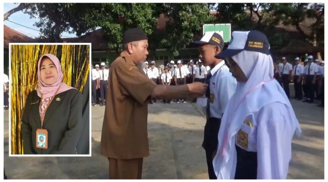 Penyematan tanda peserta MPLS SMPN 3 Tanjunganom (insert: Wiwik Wasilatinikmah. S.Pd., M.Si., Kepala SMPN 3 Tanjunganom) (Foto_asep)